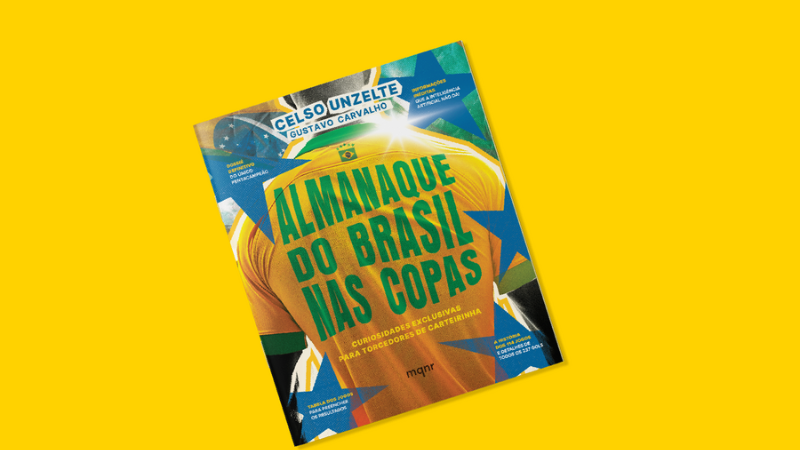 Capa do livro “Almanaque do Brasil nas Copas” sobre fundo amarelo durante programação de maio no Museu do Futebol.